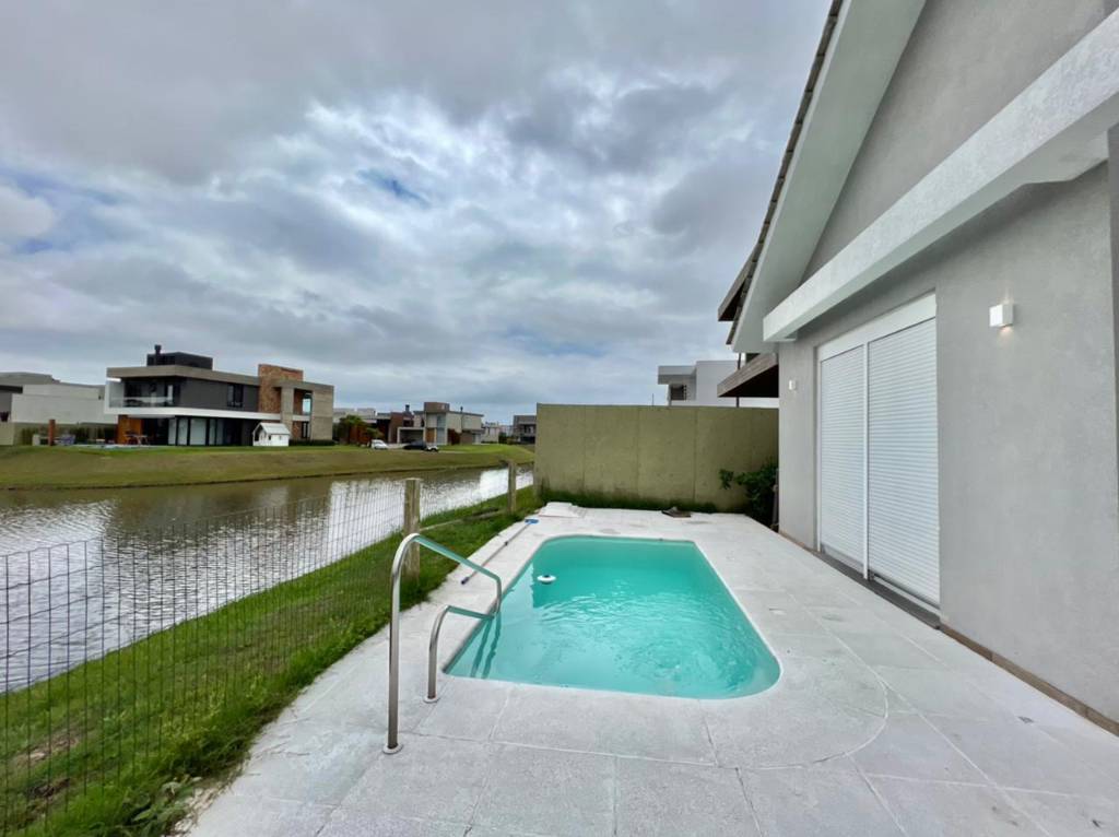 Casa em Condomínio 4 dormitórios para venda, Parque Antartica em Capão da Canoa | Ref.: 10222