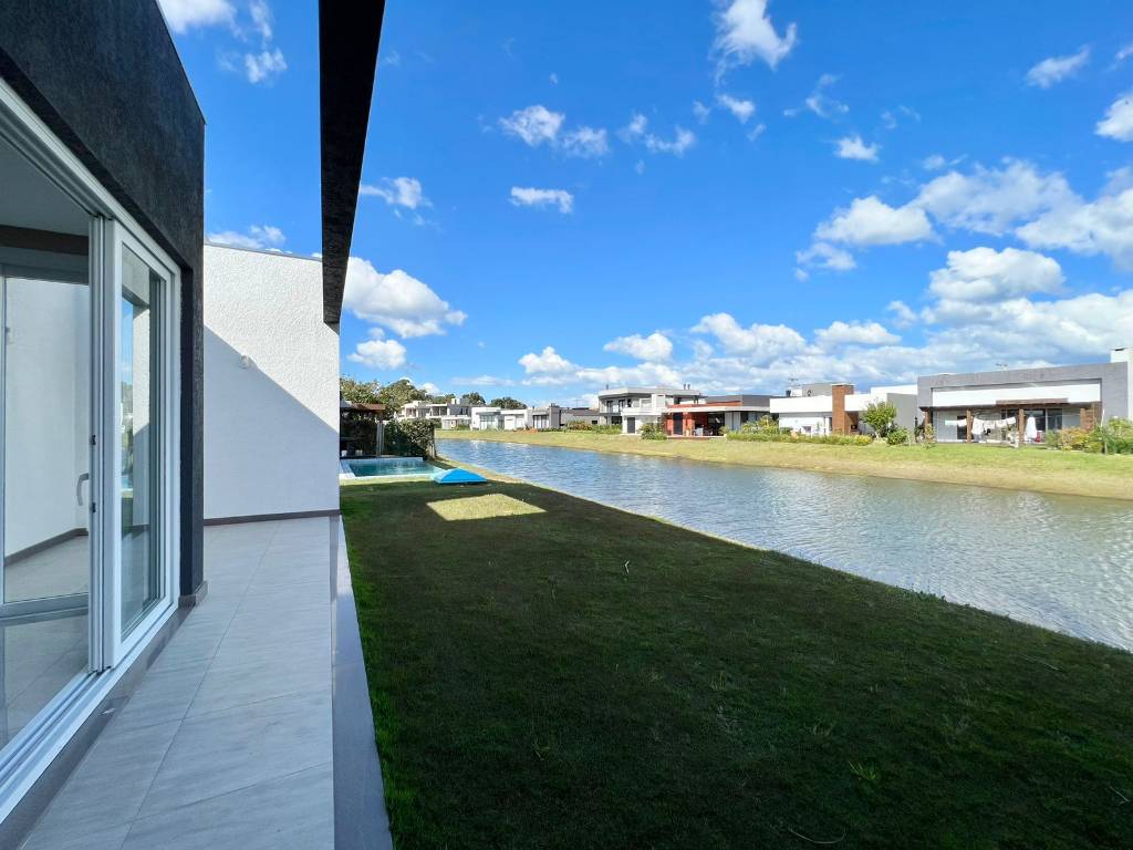 Casa em Condomínio 4 dormitórios em Capão da Canoa | Ref.: 9505